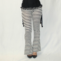 argyle striped pant, black and white, clown core, harlequin, flared legging, diamond pattern, vintage, funky, stretchy
